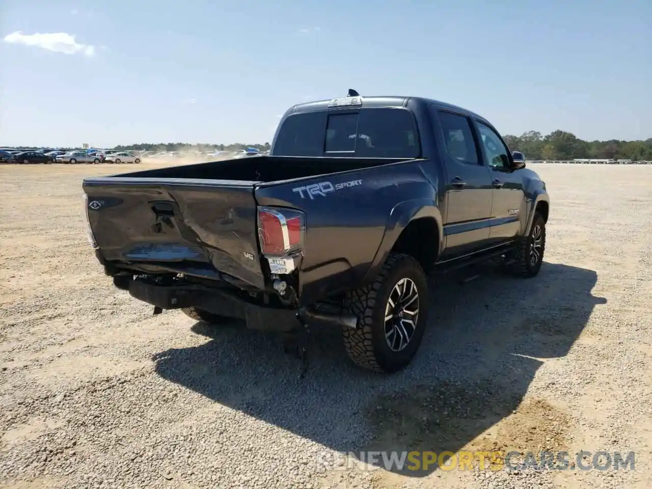 4 Photograph of a damaged car 3TMAZ5CN0NM186643 TOYOTA TACOMA 2022