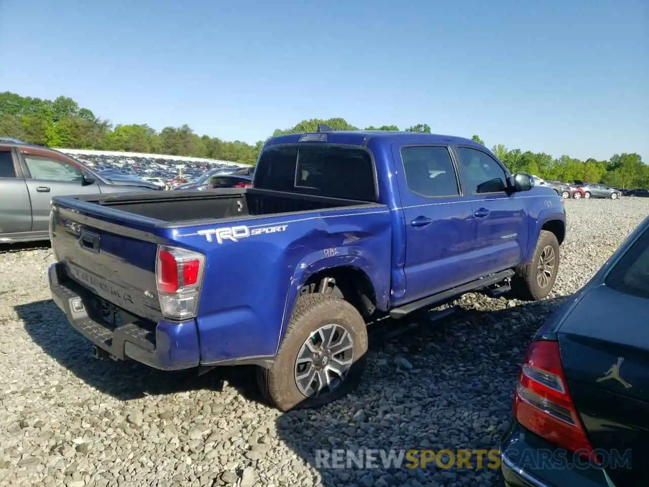 4 Photograph of a damaged car 3TMAZ5CN1NM165980 TOYOTA TACOMA 2022