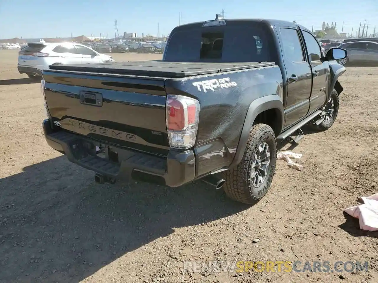 4 Photograph of a damaged car 3TMAZ5CN1NM184321 TOYOTA TACOMA 2022