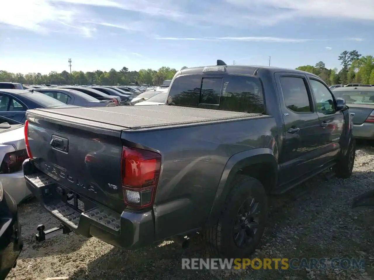 4 Photograph of a damaged car 3TMAZ5CN6NM165151 TOYOTA TACOMA 2022