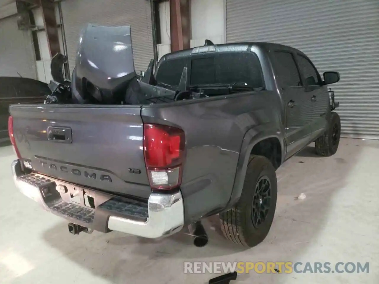 4 Photograph of a damaged car 3TMAZ5CN7NM160928 TOYOTA TACOMA 2022