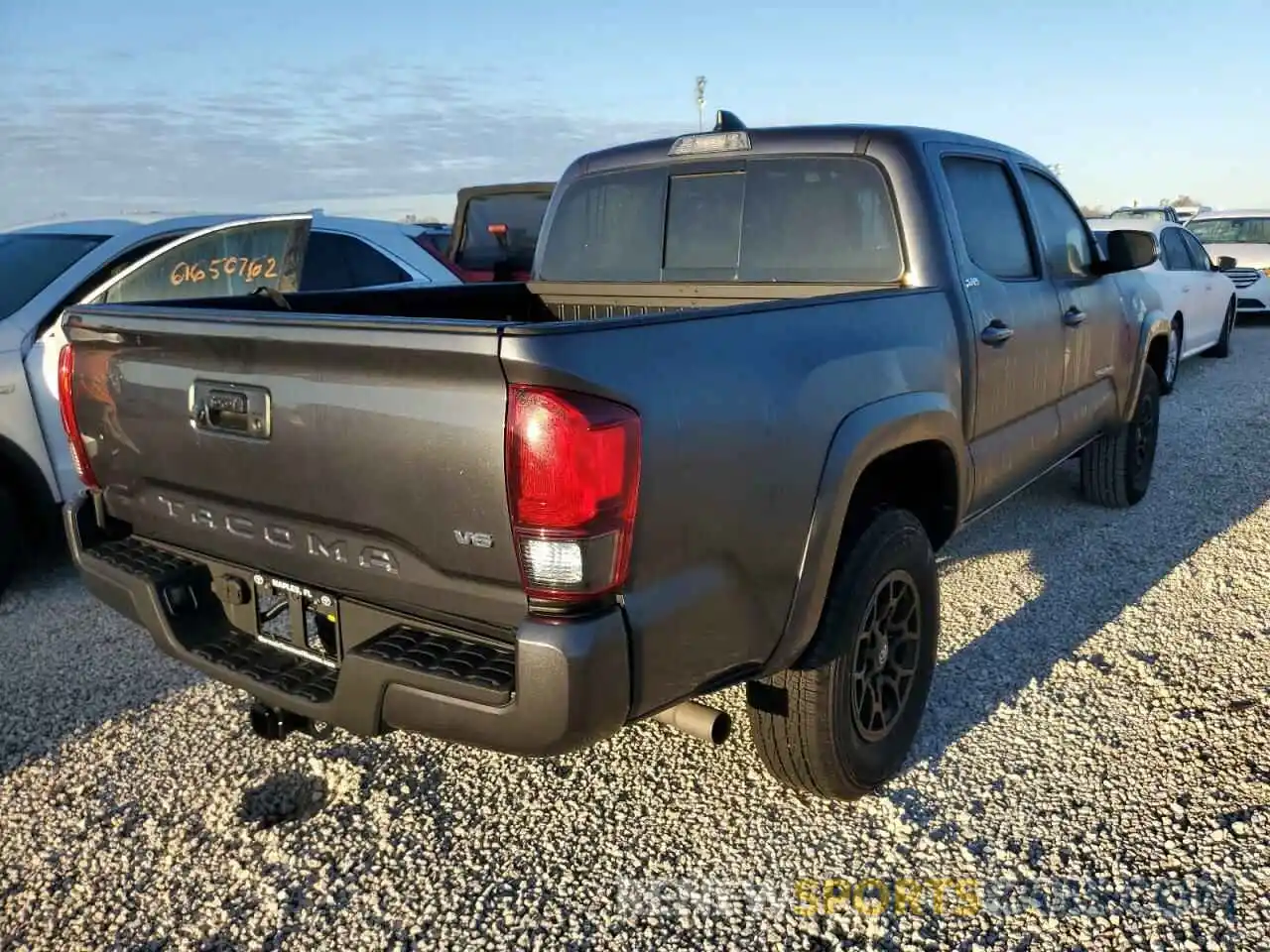 4 Photograph of a damaged car 3TMAZ5CN9NM181263 TOYOTA TACOMA 2022