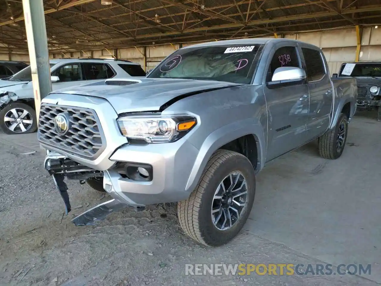 2 Photograph of a damaged car 3TMAZ5CNXNM177514 TOYOTA TACOMA 2022