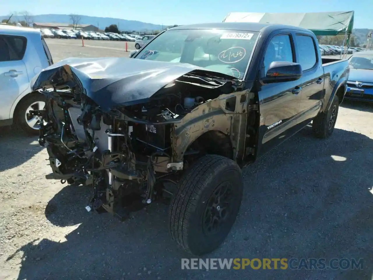 2 Photograph of a damaged car 3TMBZ5DN0NM032811 TOYOTA TACOMA 2022