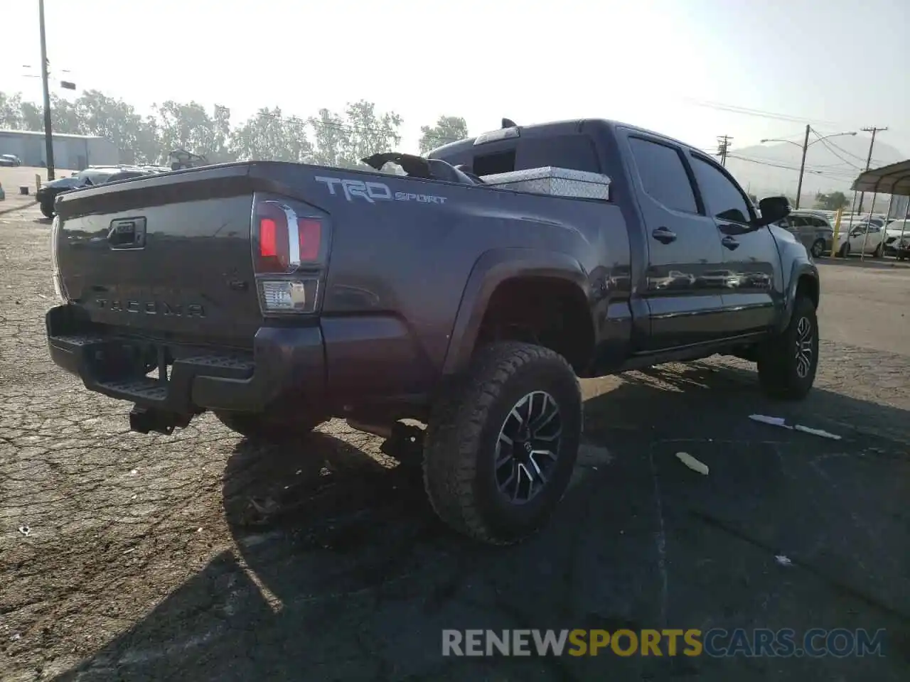 4 Photograph of a damaged car 3TMBZ5DN0NM035157 TOYOTA TACOMA 2022