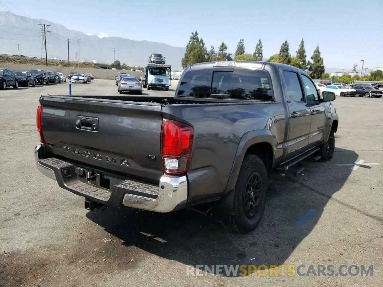 4 Photograph of a damaged car 3TMBZ5DN3NM032950 TOYOTA TACOMA 2022