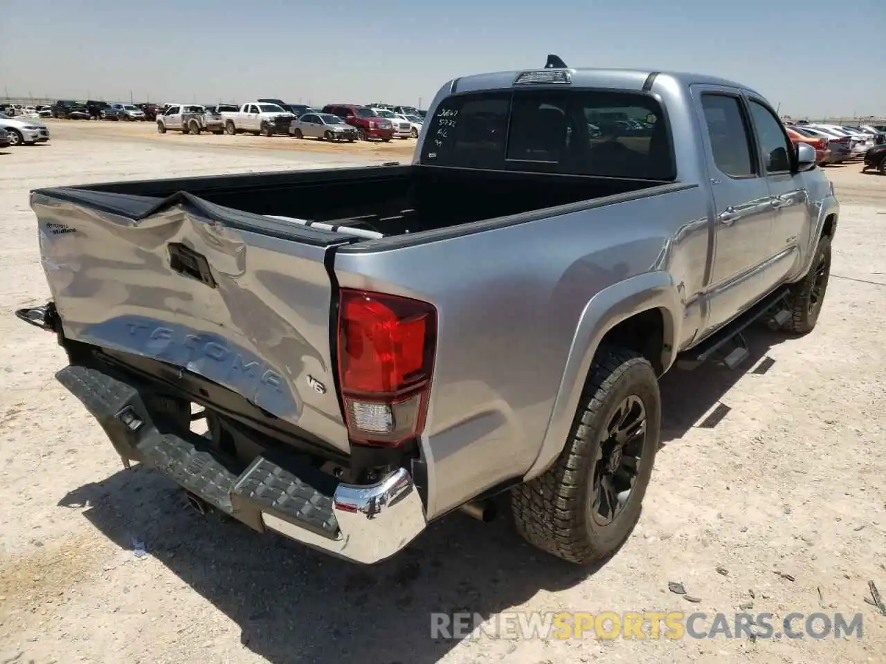 4 Photograph of a damaged car 3TMBZ5DN6NM033199 TOYOTA TACOMA 2022