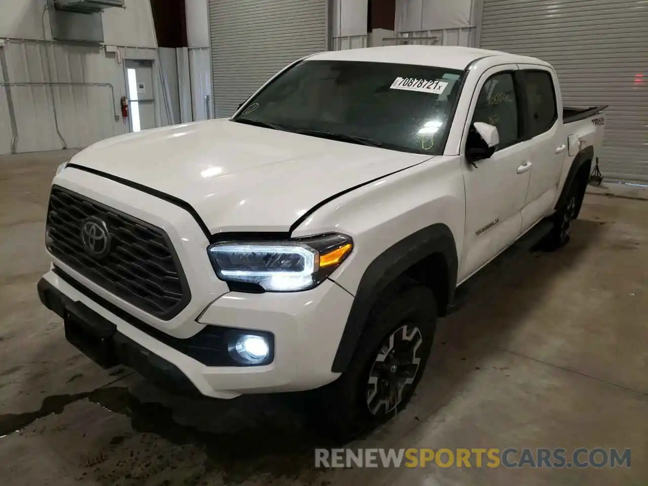 2 Photograph of a damaged car 3TMCZ5AN2NM455673 TOYOTA TACOMA 2022