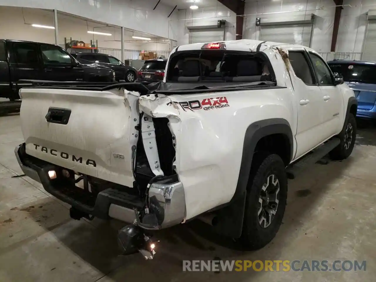 4 Photograph of a damaged car 3TMCZ5AN2NM455673 TOYOTA TACOMA 2022