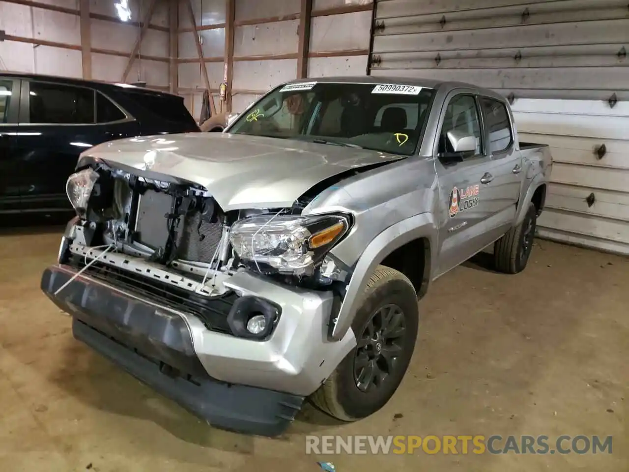 2 Photograph of a damaged car 3TMCZ5AN3NM456850 TOYOTA TACOMA 2022