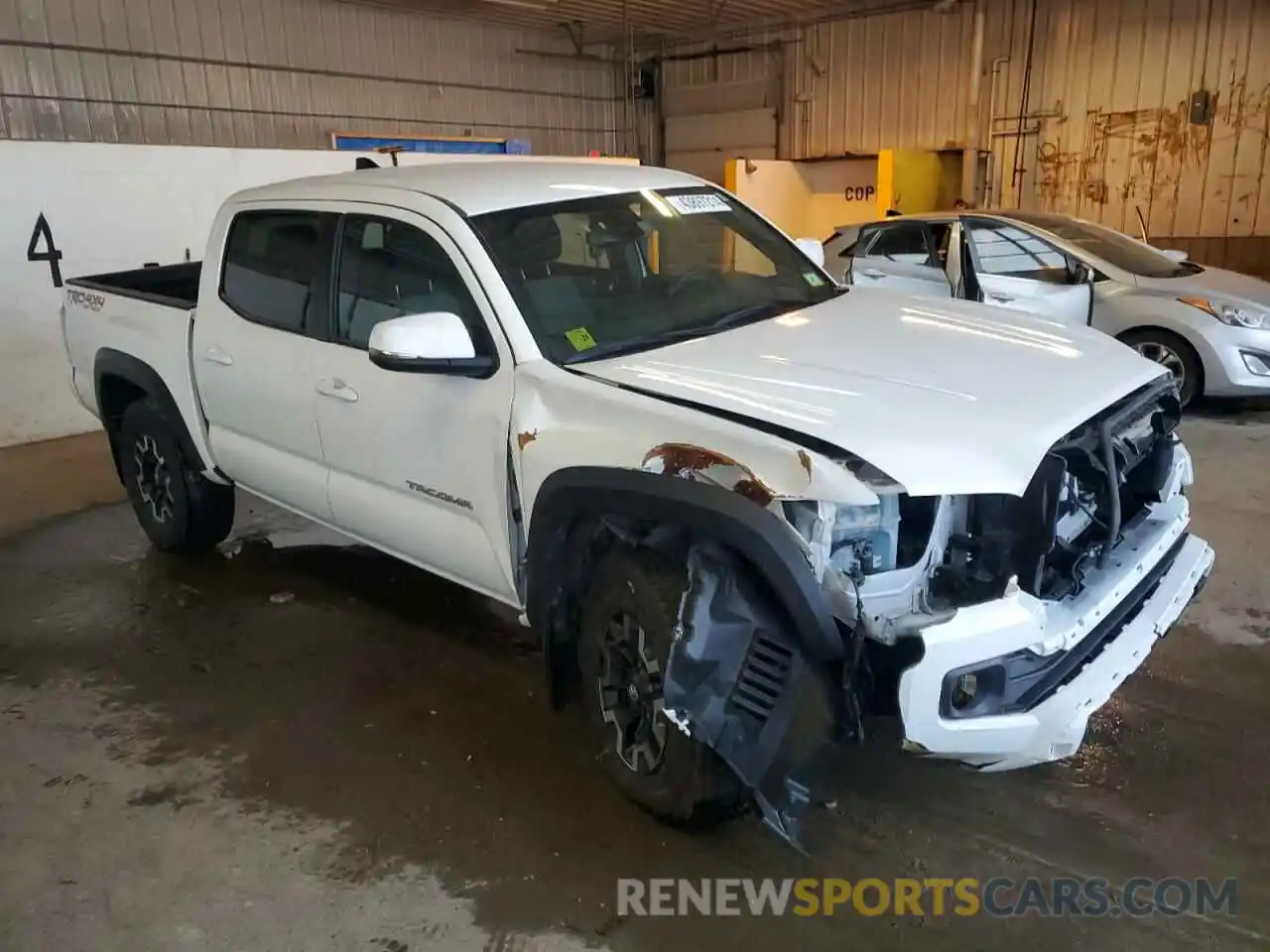 4 Photograph of a damaged car 3TMCZ5AN5NM465114 TOYOTA TACOMA 2022