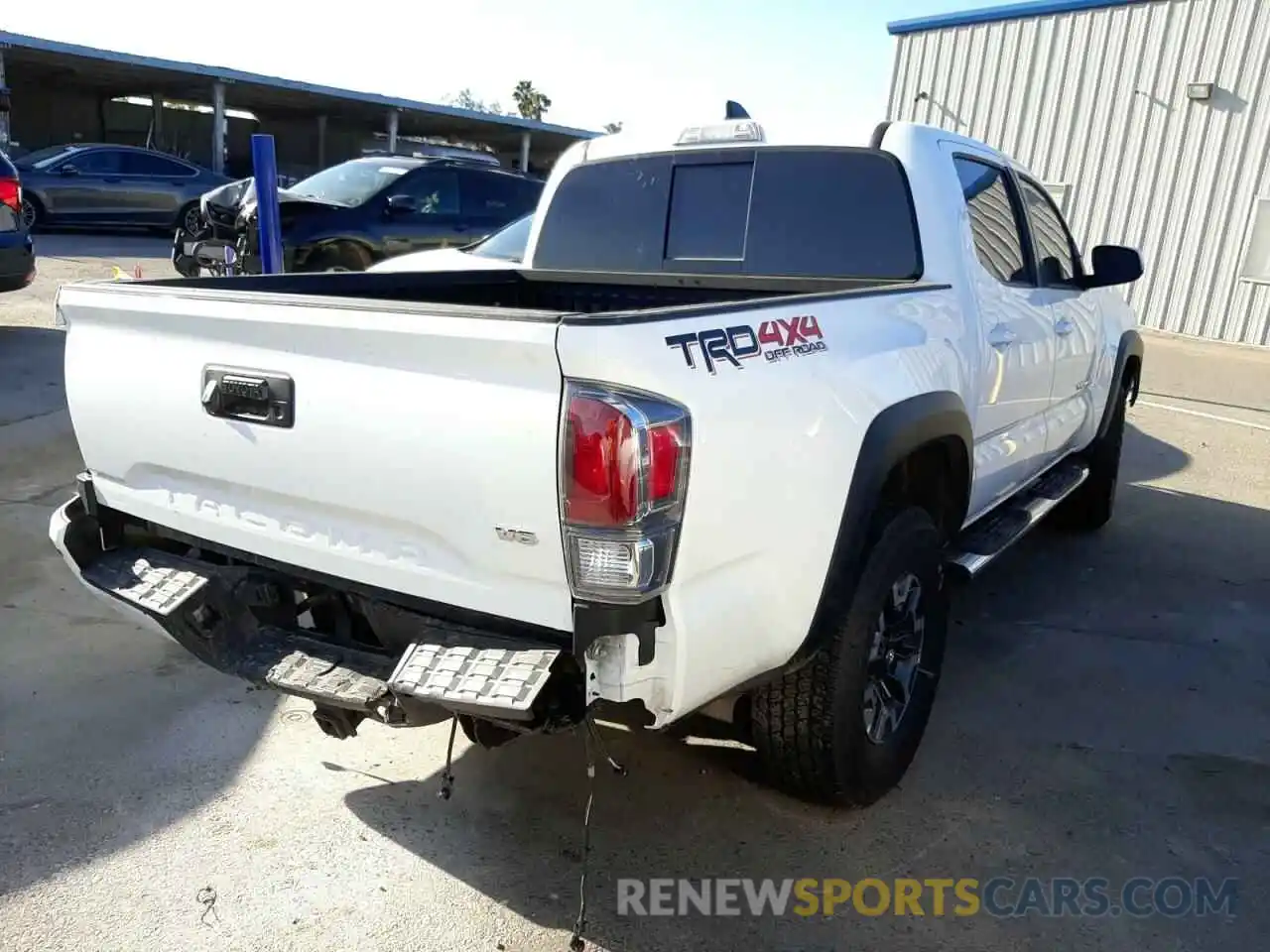 4 Photograph of a damaged car 3TMCZ5AN6NM456275 TOYOTA TACOMA 2022