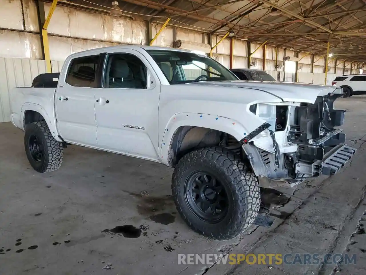 4 Photograph of a damaged car 3TMCZ5AN6NM468054 TOYOTA TACOMA 2022