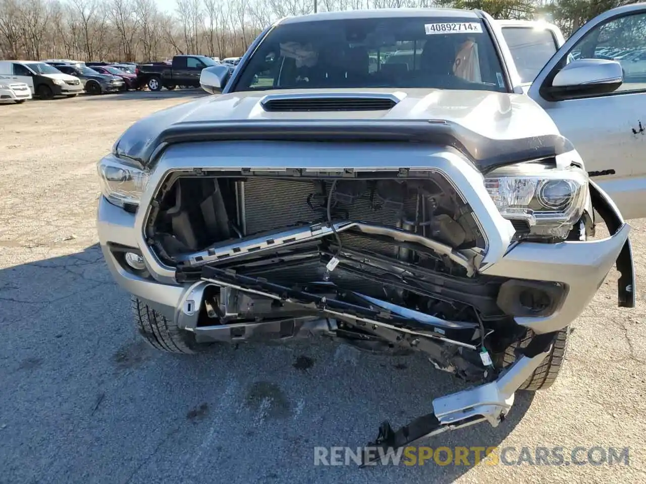 11 Photograph of a damaged car 3TMCZ5AN7NM453899 TOYOTA TACOMA 2022