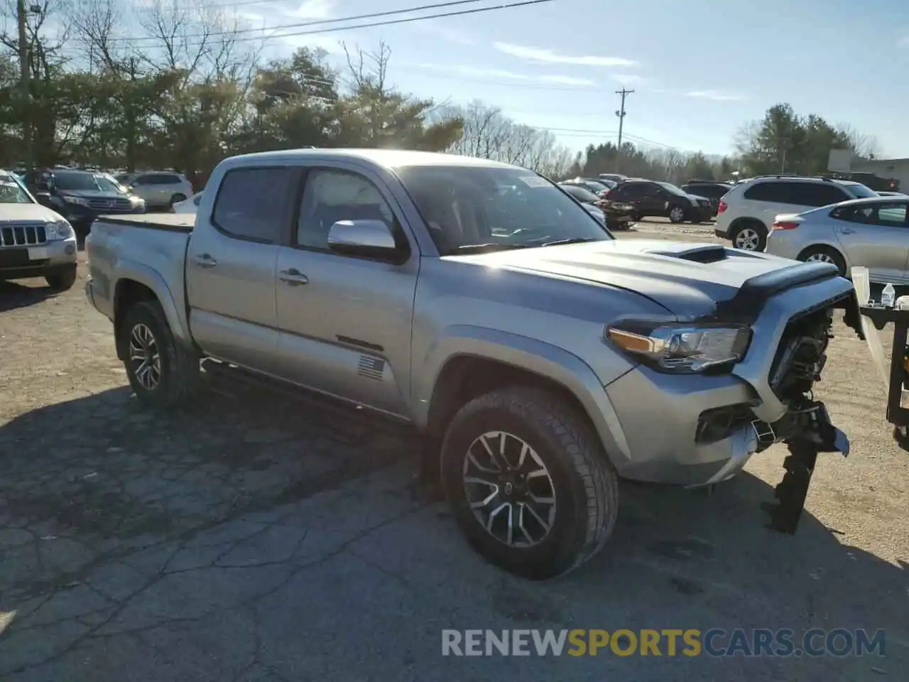 4 Photograph of a damaged car 3TMCZ5AN7NM453899 TOYOTA TACOMA 2022