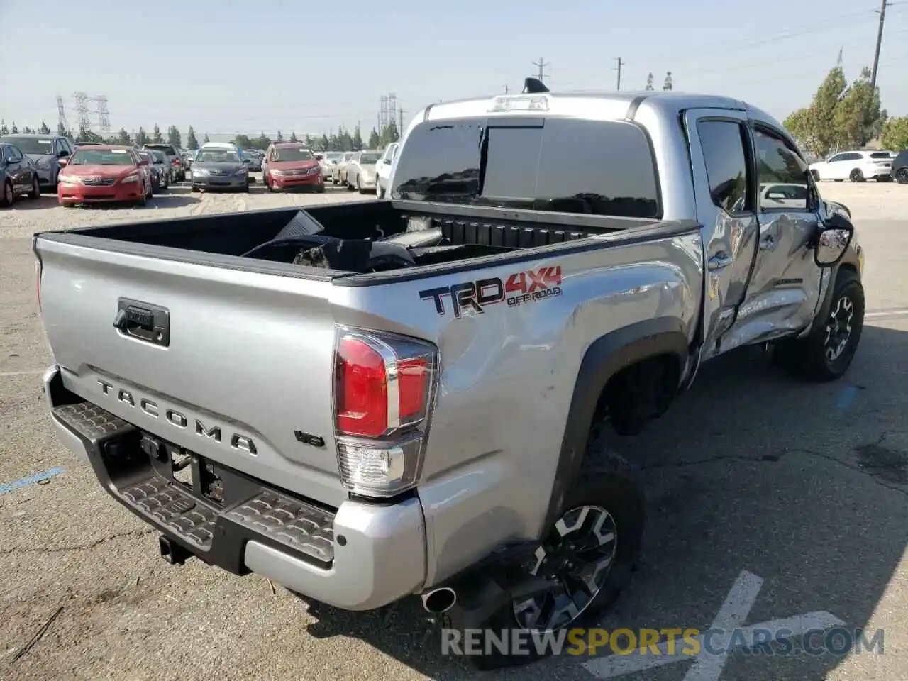 4 Photograph of a damaged car 3TMCZ5AN9NM469179 TOYOTA TACOMA 2022