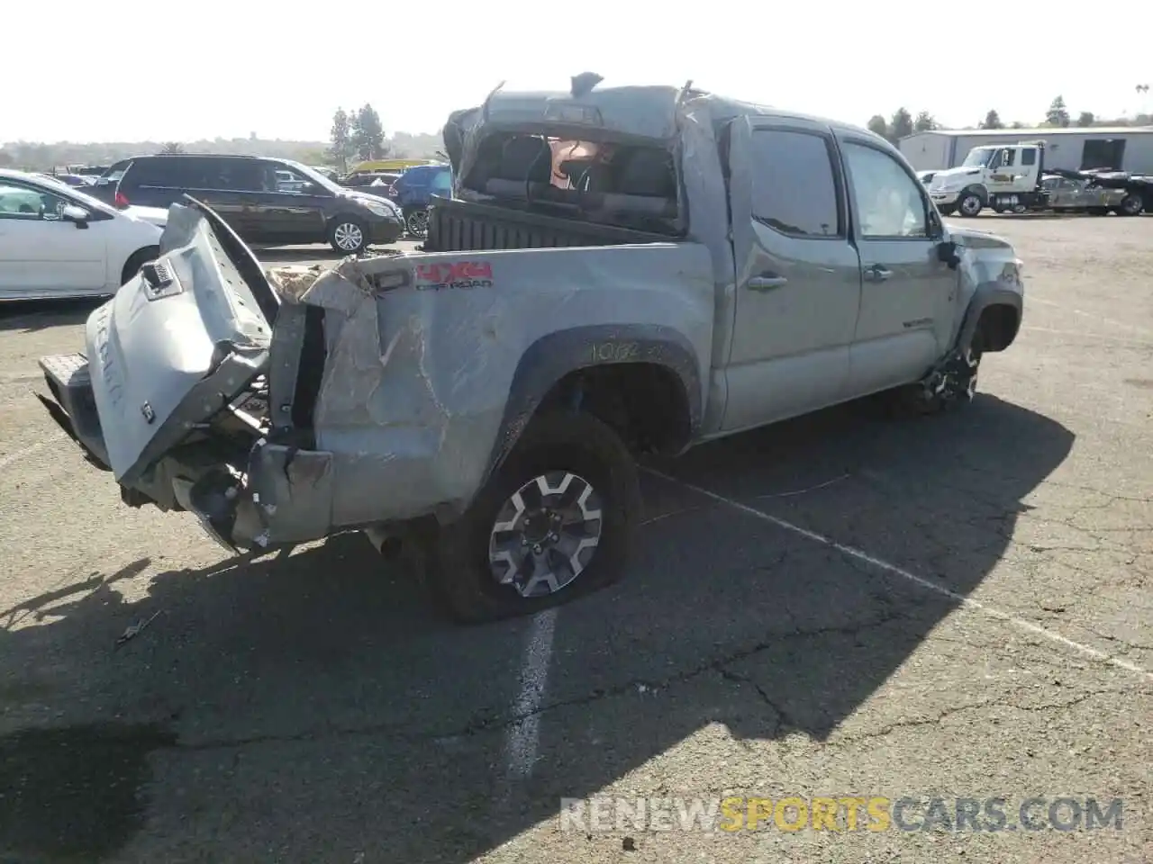 4 Photograph of a damaged car 3TMCZ5AN9NM486077 TOYOTA TACOMA 2022