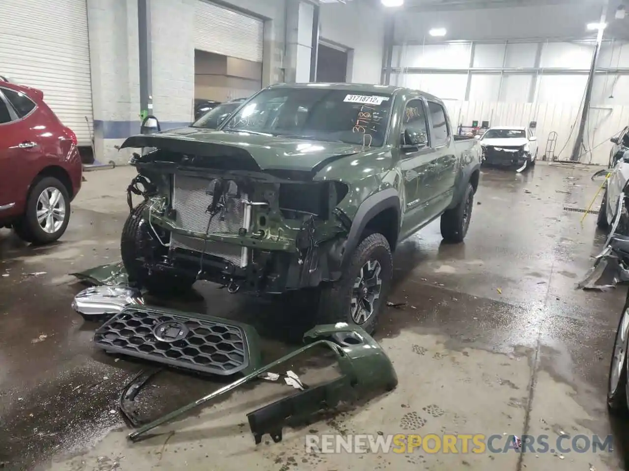 2 Photograph of a damaged car 3TMDZ5BN6NM123366 TOYOTA TACOMA 2022