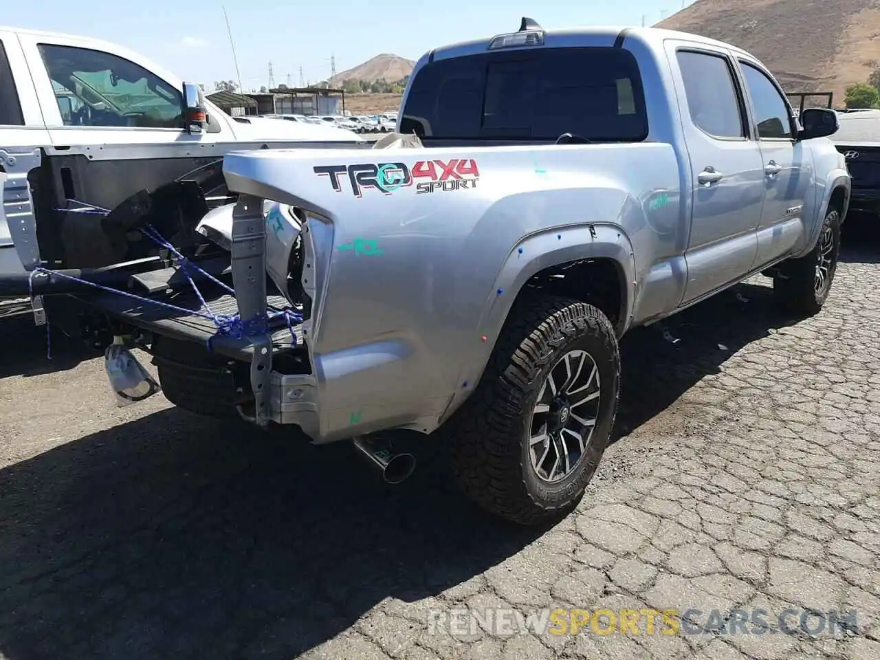 4 Photograph of a damaged car 3TMDZ5BN8NM127029 TOYOTA TACOMA 2022