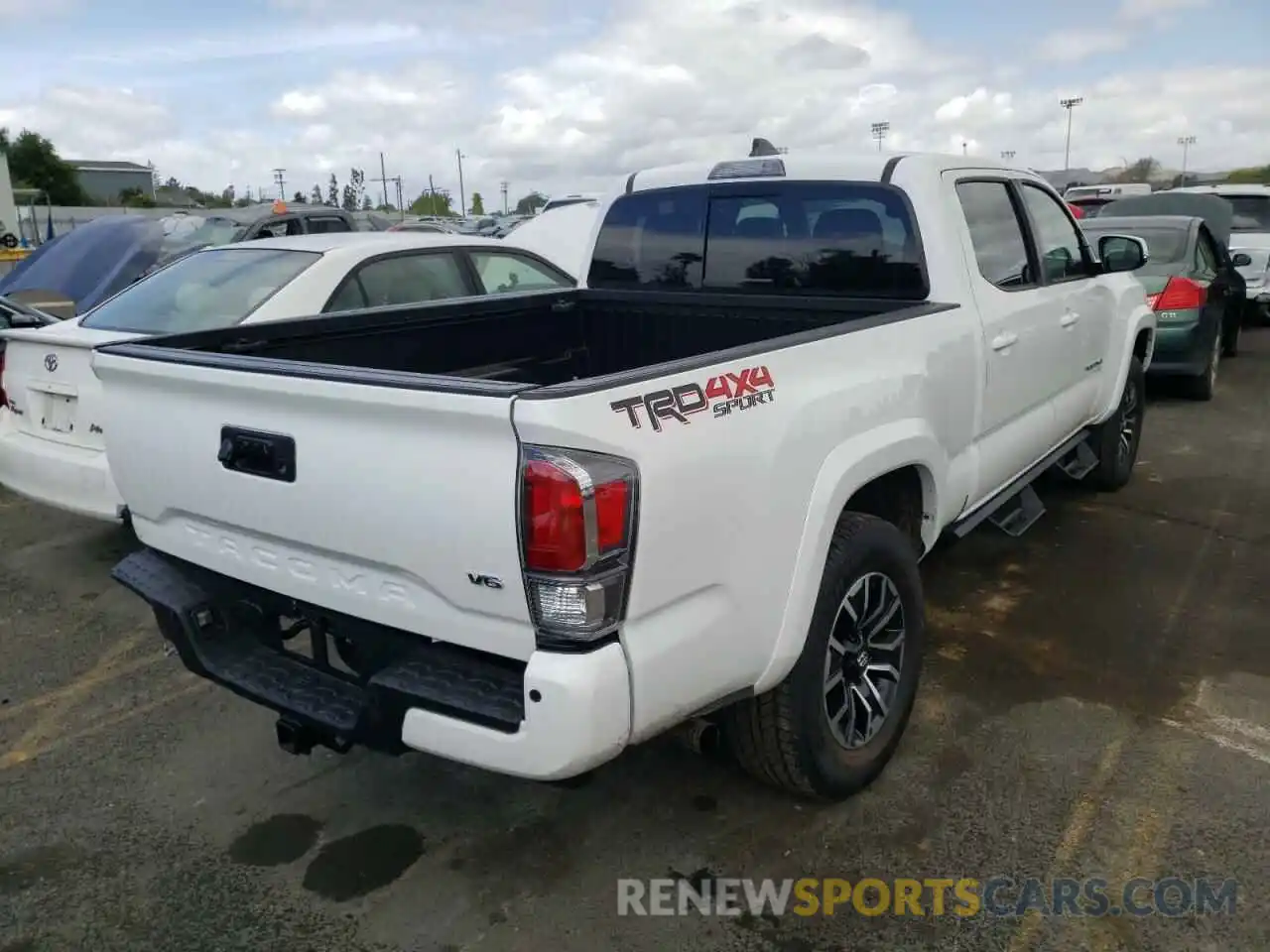 4 Photograph of a damaged car 3TMDZ5BN8NM127628 TOYOTA TACOMA 2022