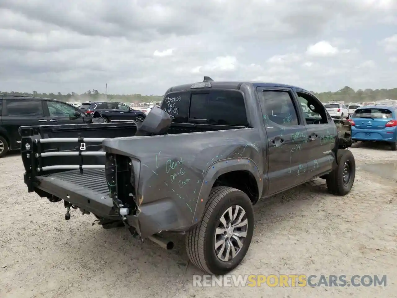 4 Photograph of a damaged car 3TMGZ5AN6NM474440 TOYOTA TACOMA 2022