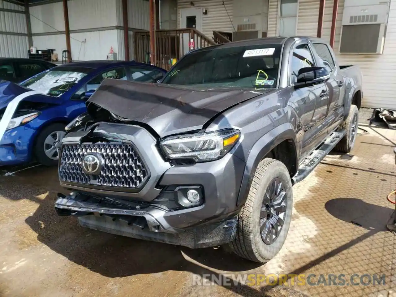 2 Photograph of a damaged car 3TMGZ5AN9NM462069 TOYOTA TACOMA 2022