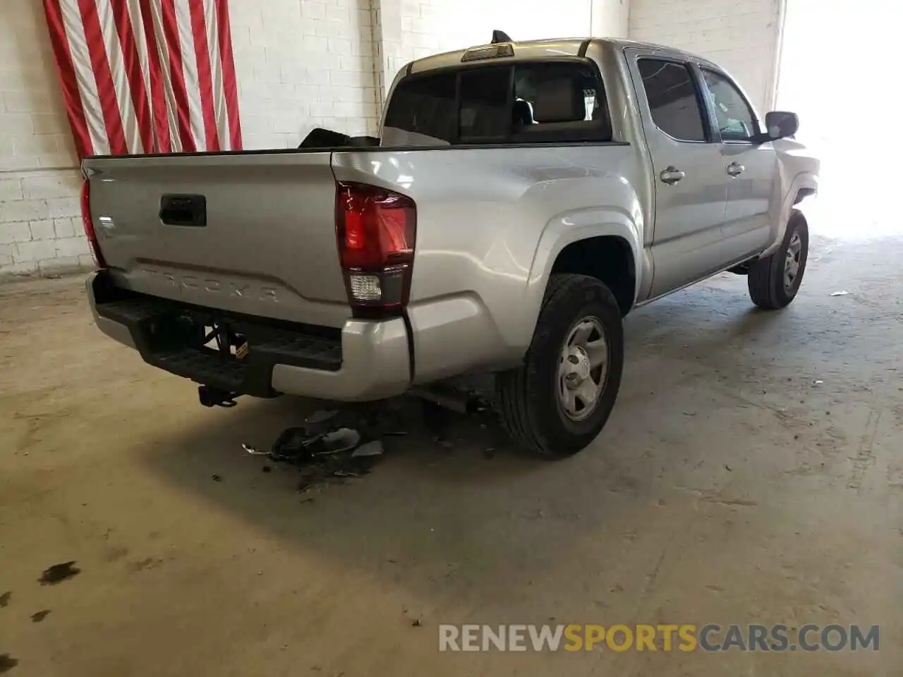 4 Photograph of a damaged car 3TYAX5GN9NT043257 TOYOTA TACOMA 2022