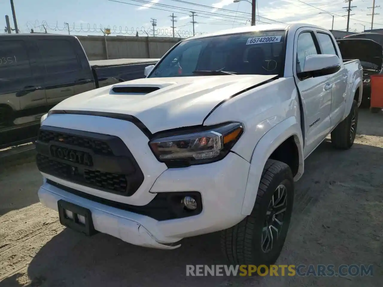 2 Photograph of a damaged car 3TYAZ5CN9NT013109 TOYOTA TACOMA 2022