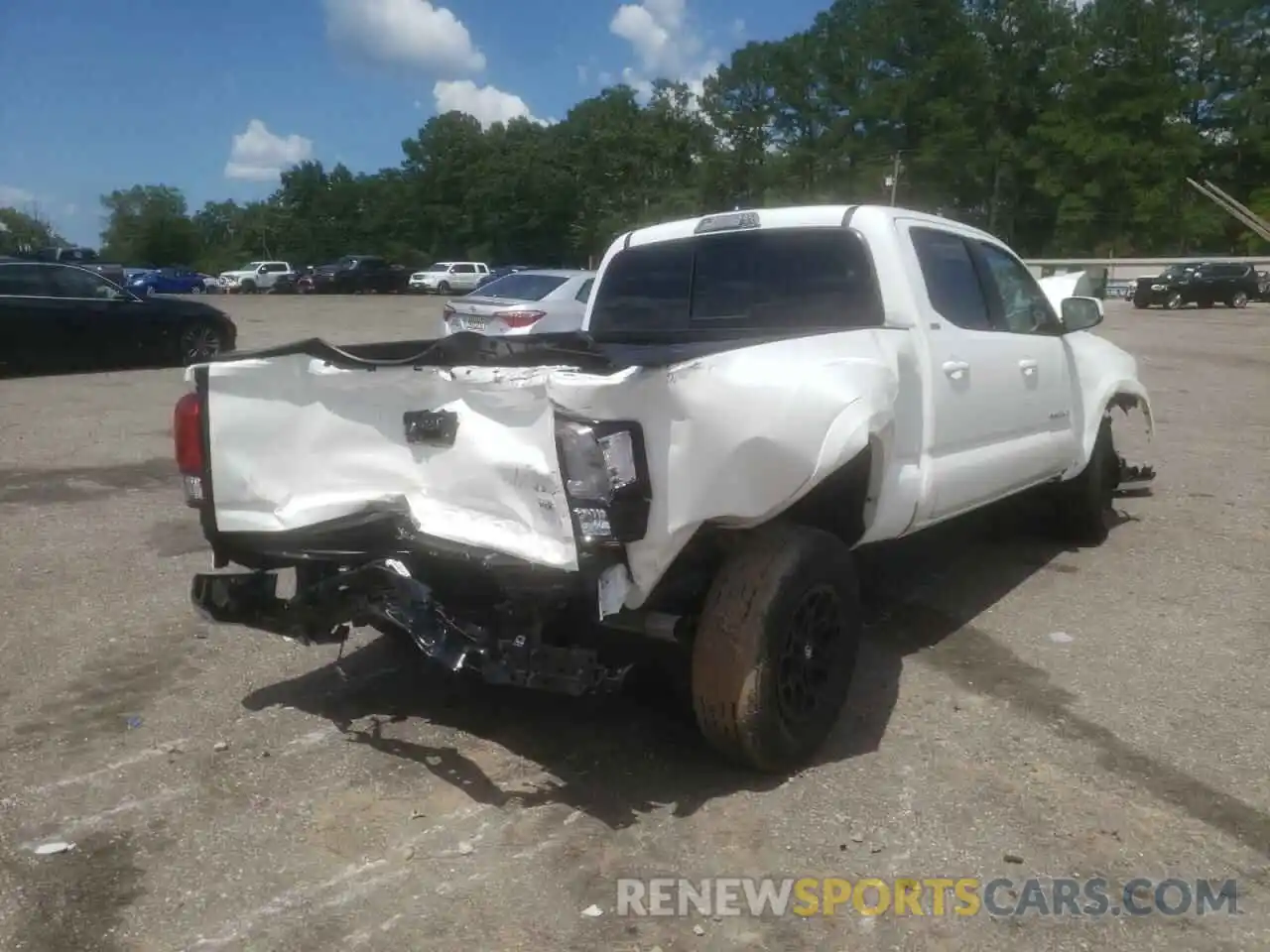 4 Photograph of a damaged car 3TYBZ5DN1NT001474 TOYOTA TACOMA 2022