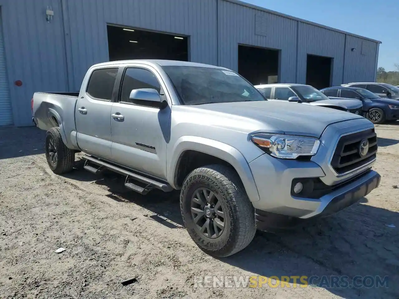 4 Photograph of a damaged car 3TYDZ5BN0NT014907 TOYOTA TACOMA 2022