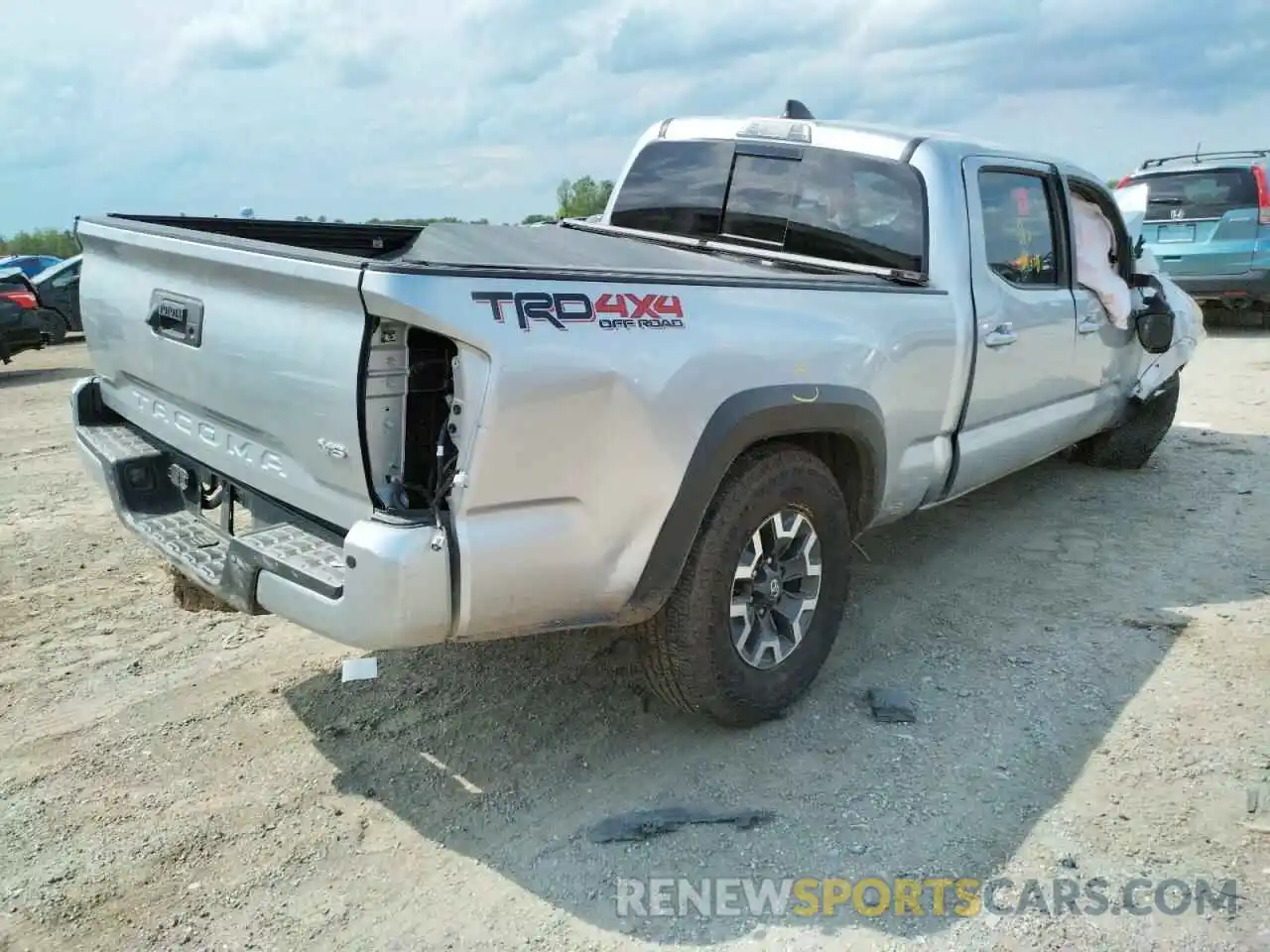 4 Photograph of a damaged car 3TYDZ5BN4NT005966 TOYOTA TACOMA 2022