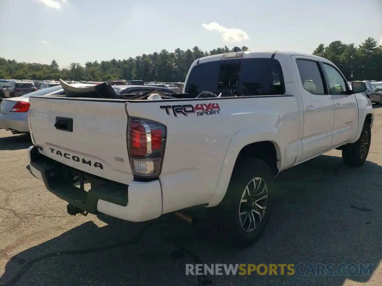 4 Photograph of a damaged car 3TYDZ5BN4NT012741 TOYOTA TACOMA 2022