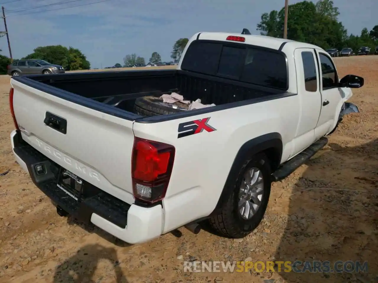 4 Photograph of a damaged car 3TYRZ5CNXNT014921 TOYOTA TACOMA 2022