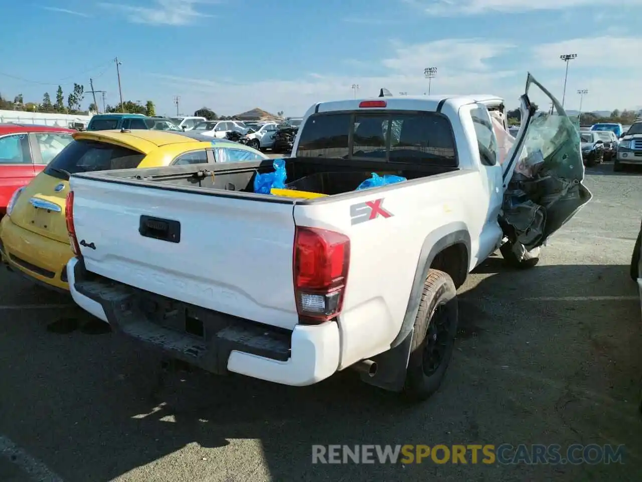 4 Photograph of a damaged car 3TYSZ5AN9NT063337 TOYOTA TACOMA 2022