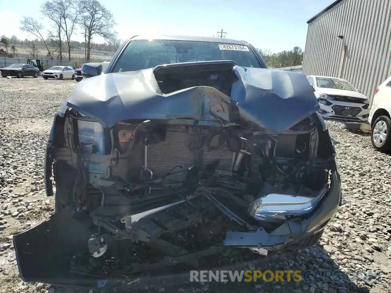 5 Photograph of a damaged car 3TMAZ5CN1PM208183 TOYOTA TACOMA 2023