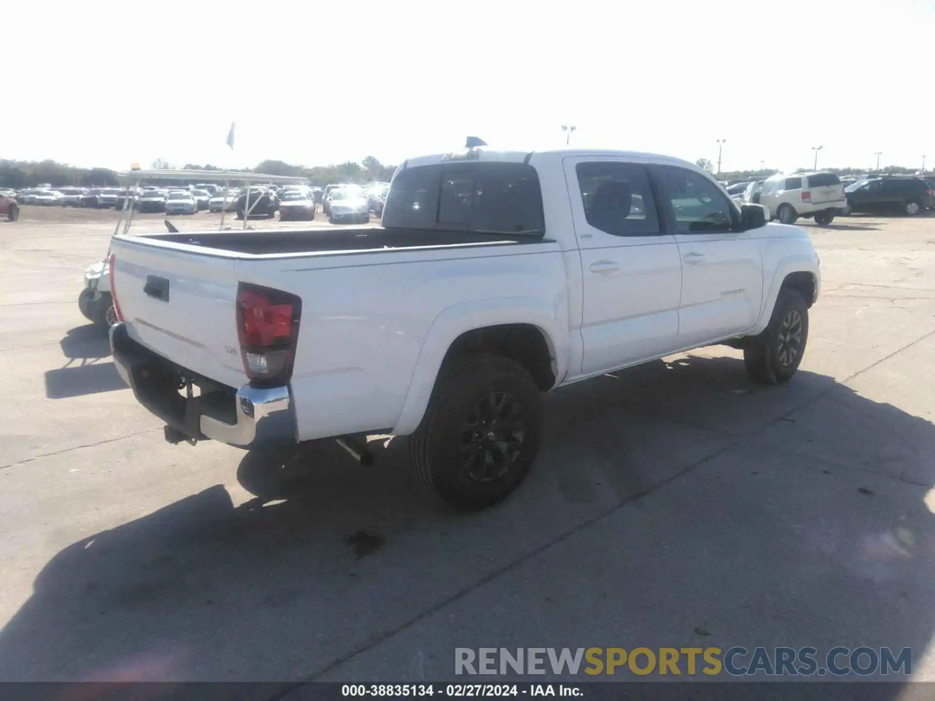 4 Photograph of a damaged car 3TMAZ5CN2PM210766 TOYOTA TACOMA 2023