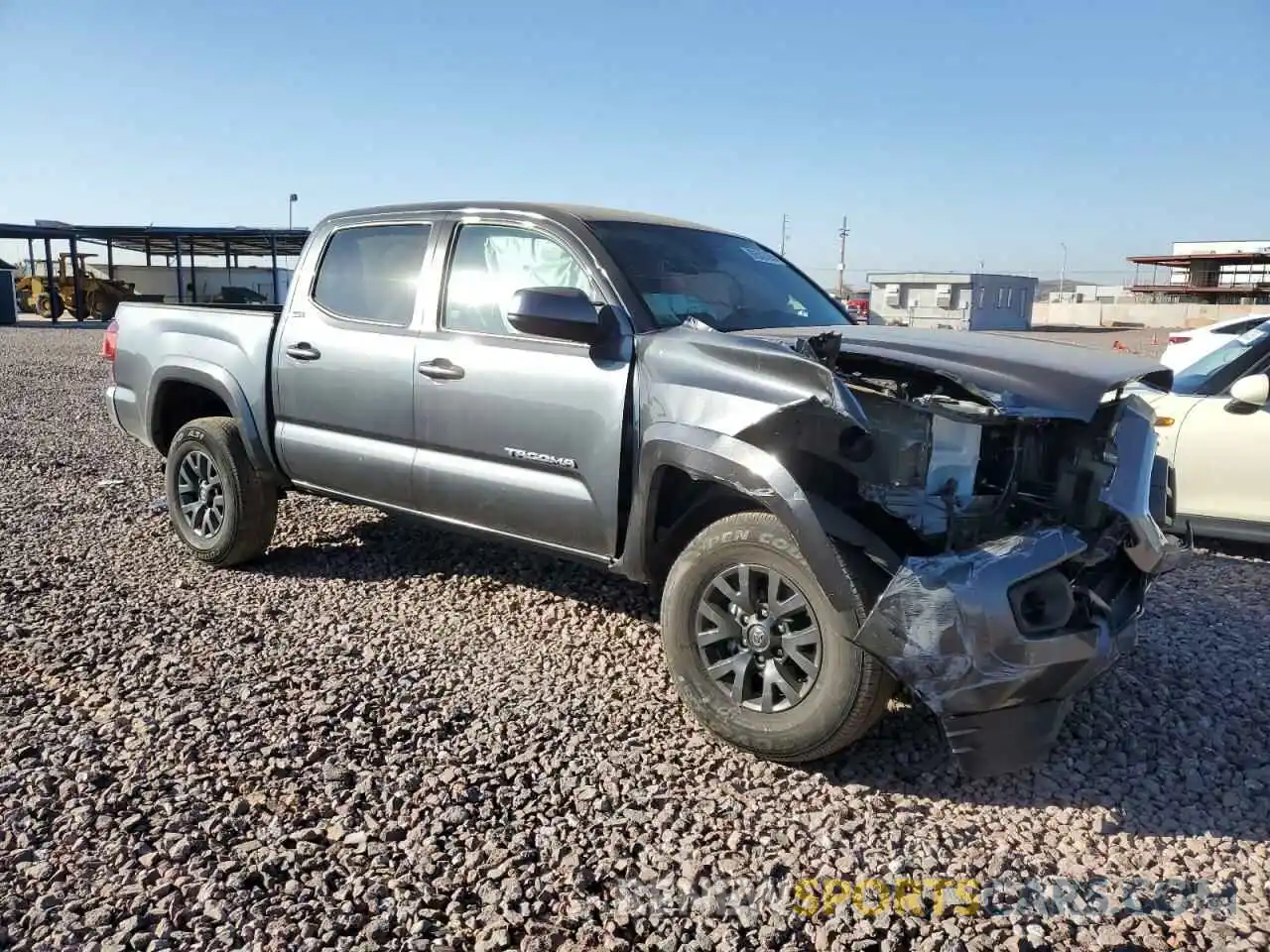 4 Photograph of a damaged car 3TMAZ5CN5PM200085 TOYOTA TACOMA 2023