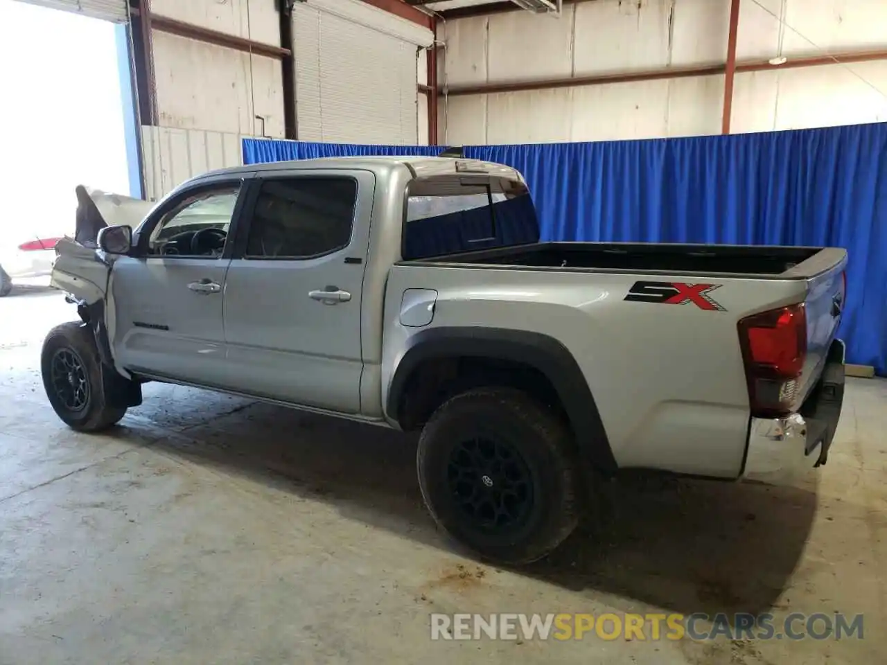 2 Photograph of a damaged car 3TMAZ5CN6PM202699 TOYOTA TACOMA 2023