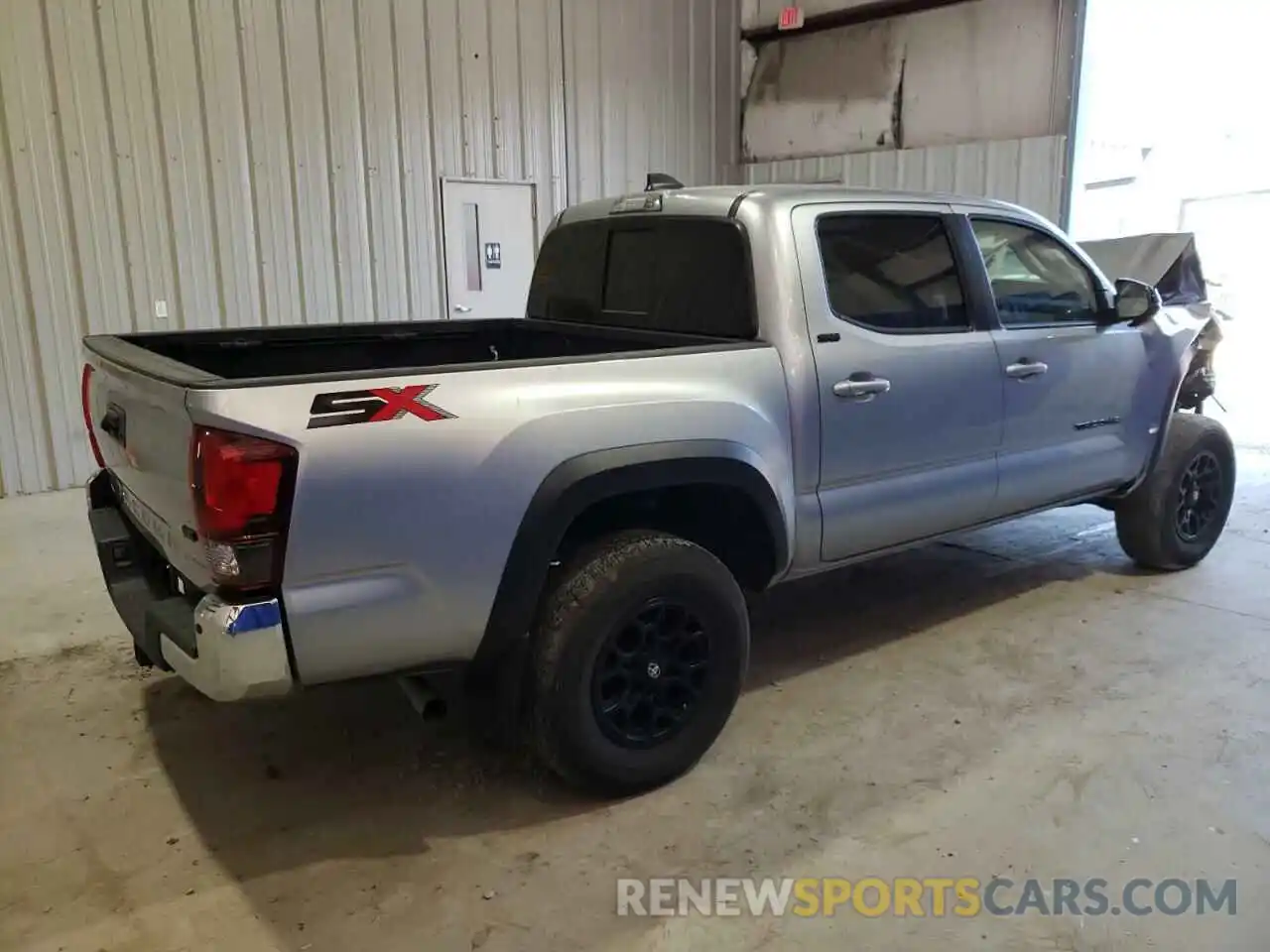 3 Photograph of a damaged car 3TMAZ5CN6PM202699 TOYOTA TACOMA 2023