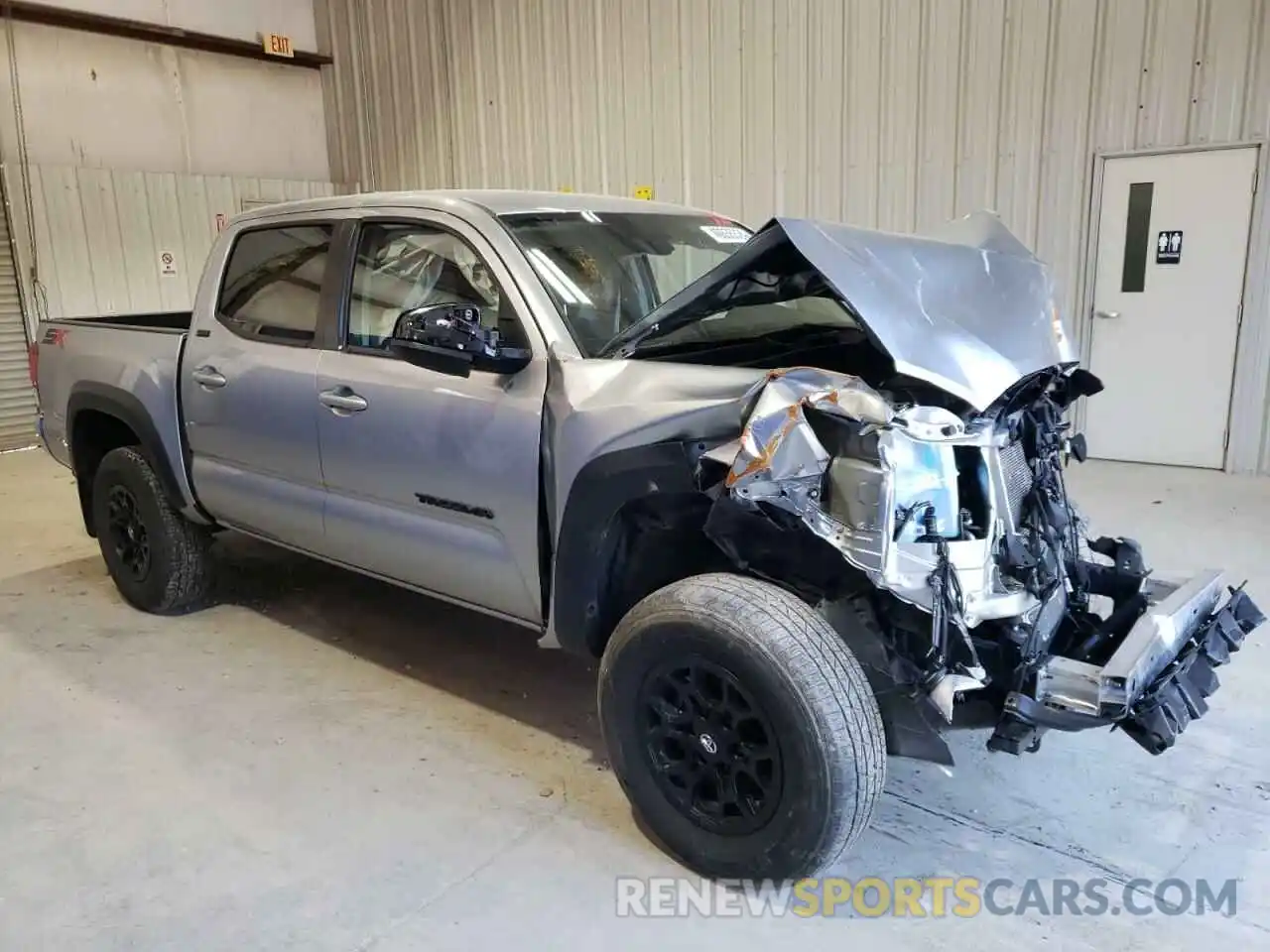 4 Photograph of a damaged car 3TMAZ5CN6PM202699 TOYOTA TACOMA 2023