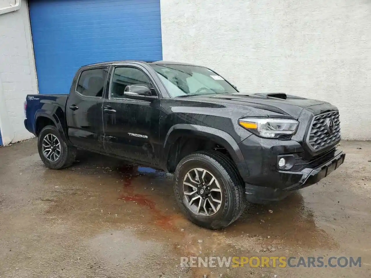 4 Photograph of a damaged car 3TMAZ5CN8PM213123 TOYOTA TACOMA 2023