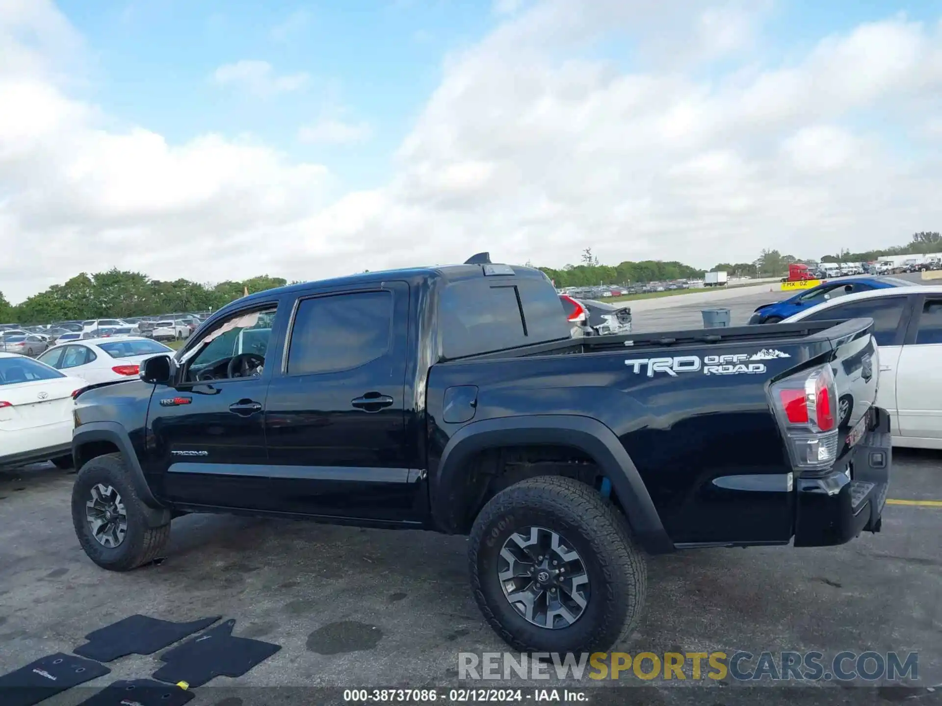 14 Photograph of a damaged car 3TMAZ5CNXPM213995 TOYOTA TACOMA 2023