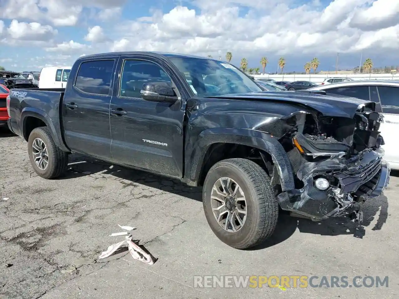 4 Photograph of a damaged car 3TMCZ5AN0PM638198 TOYOTA TACOMA 2023