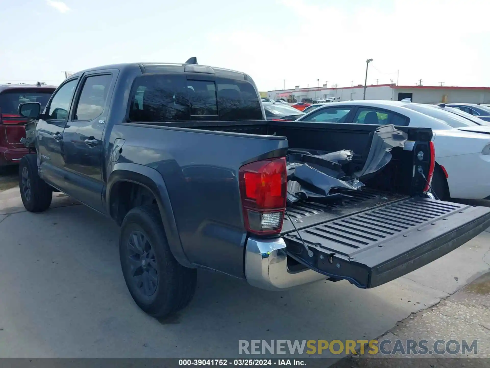 3 Photograph of a damaged car 3TMCZ5AN2PM543531 TOYOTA TACOMA 2023