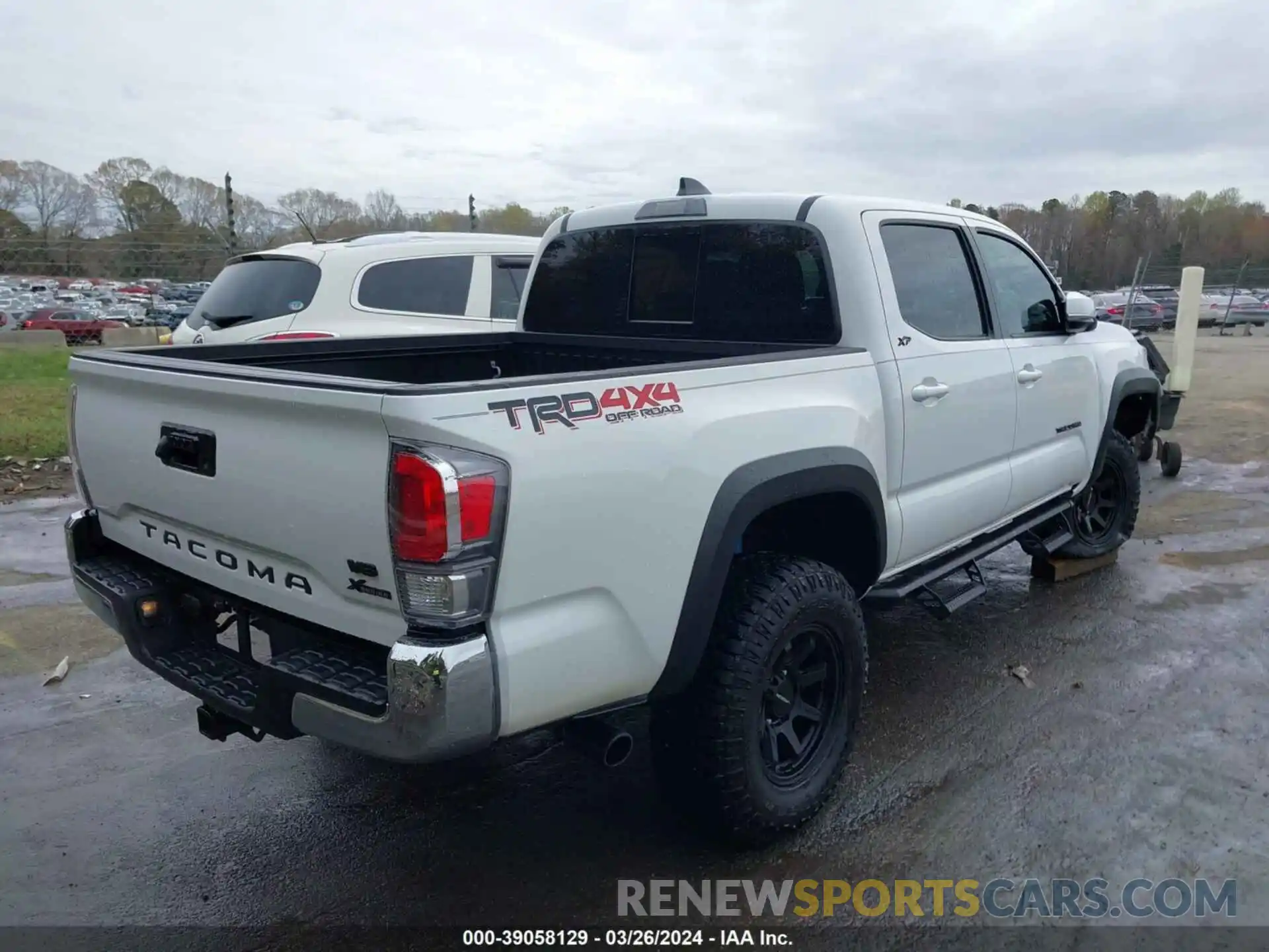 4 Photograph of a damaged car 3TMCZ5AN3PM561620 TOYOTA TACOMA 2023