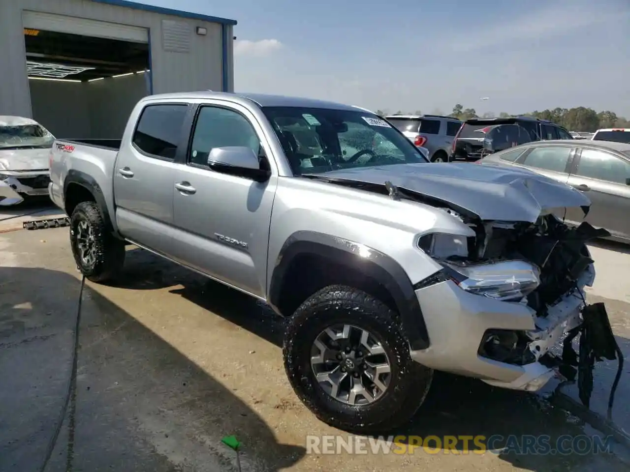 4 Photograph of a damaged car 3TMCZ5AN5PM627679 TOYOTA TACOMA 2023