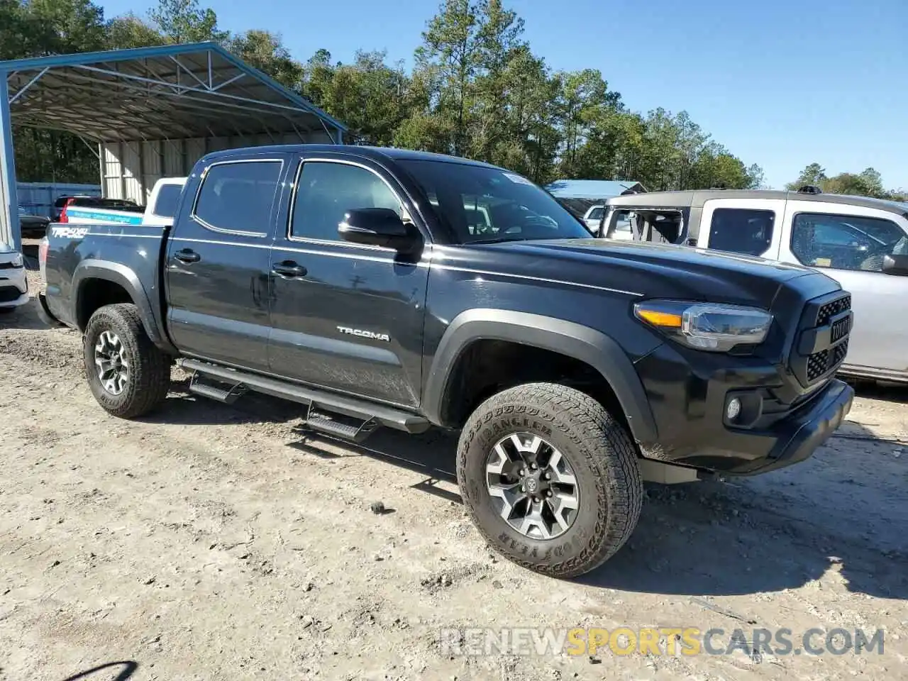 4 Photograph of a damaged car 3TMCZ5AN6PM572272 TOYOTA TACOMA 2023