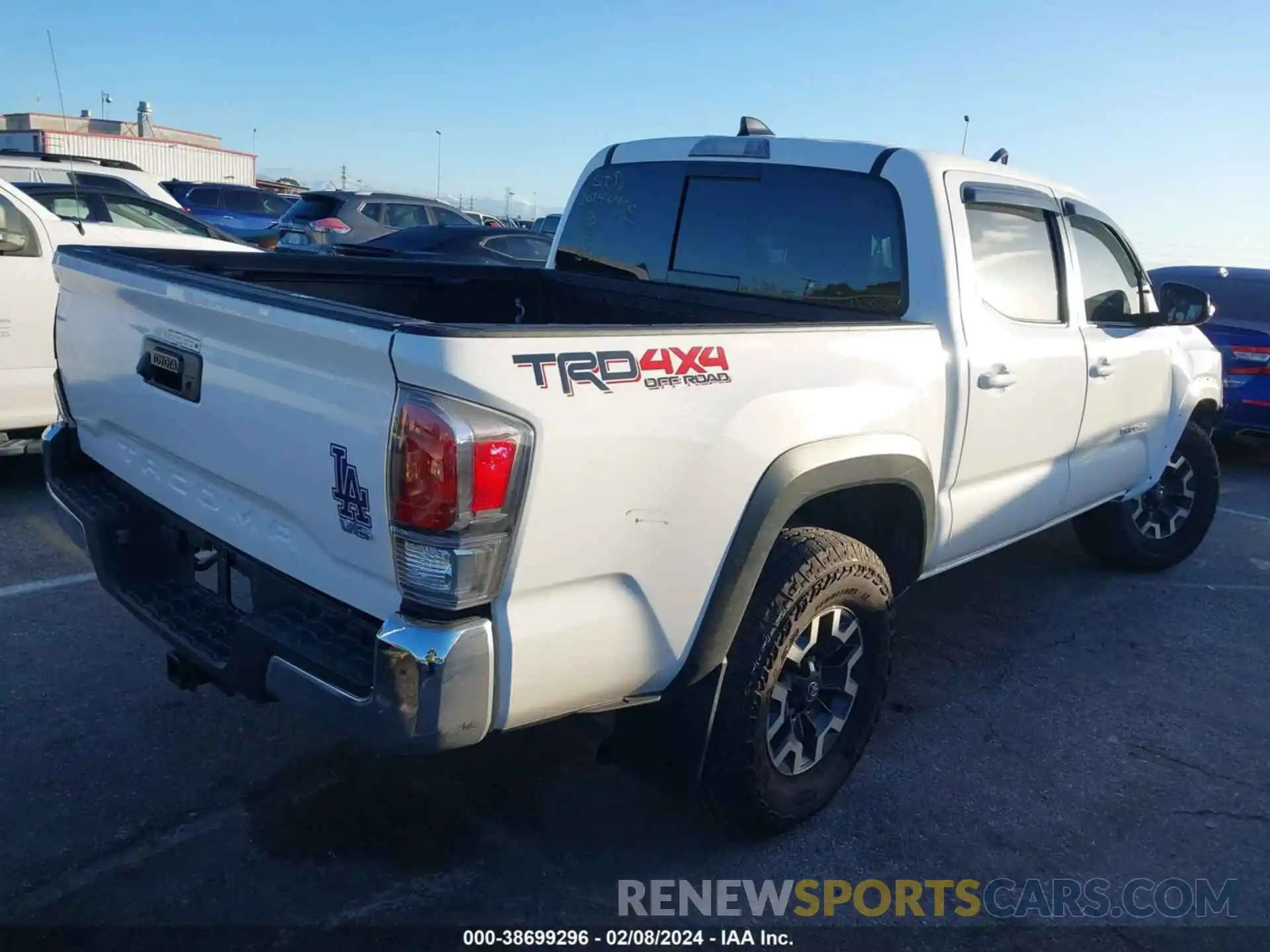 4 Photograph of a damaged car 3TMCZ5AN6PM592912 TOYOTA TACOMA 2023