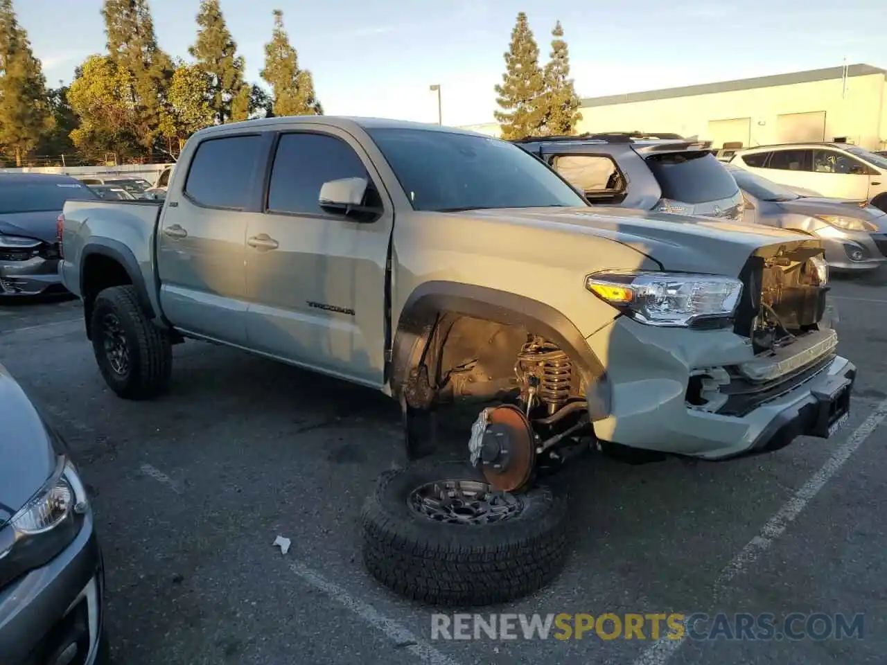 4 Photograph of a damaged car 3TMCZ5AN9PM617768 TOYOTA TACOMA 2023