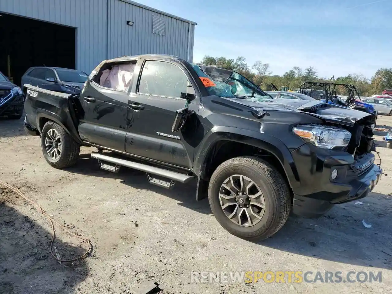 4 Photograph of a damaged car 3TMCZ5ANXPM624566 TOYOTA TACOMA 2023